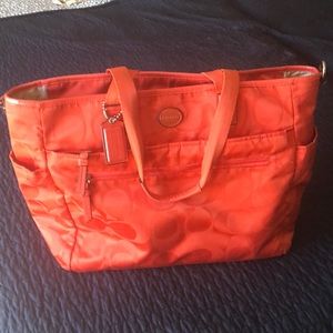 Orange coach diaper bag